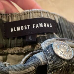 Size large camouflage denim shorts